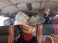Rempli au 2/3 de meubles et de sacs